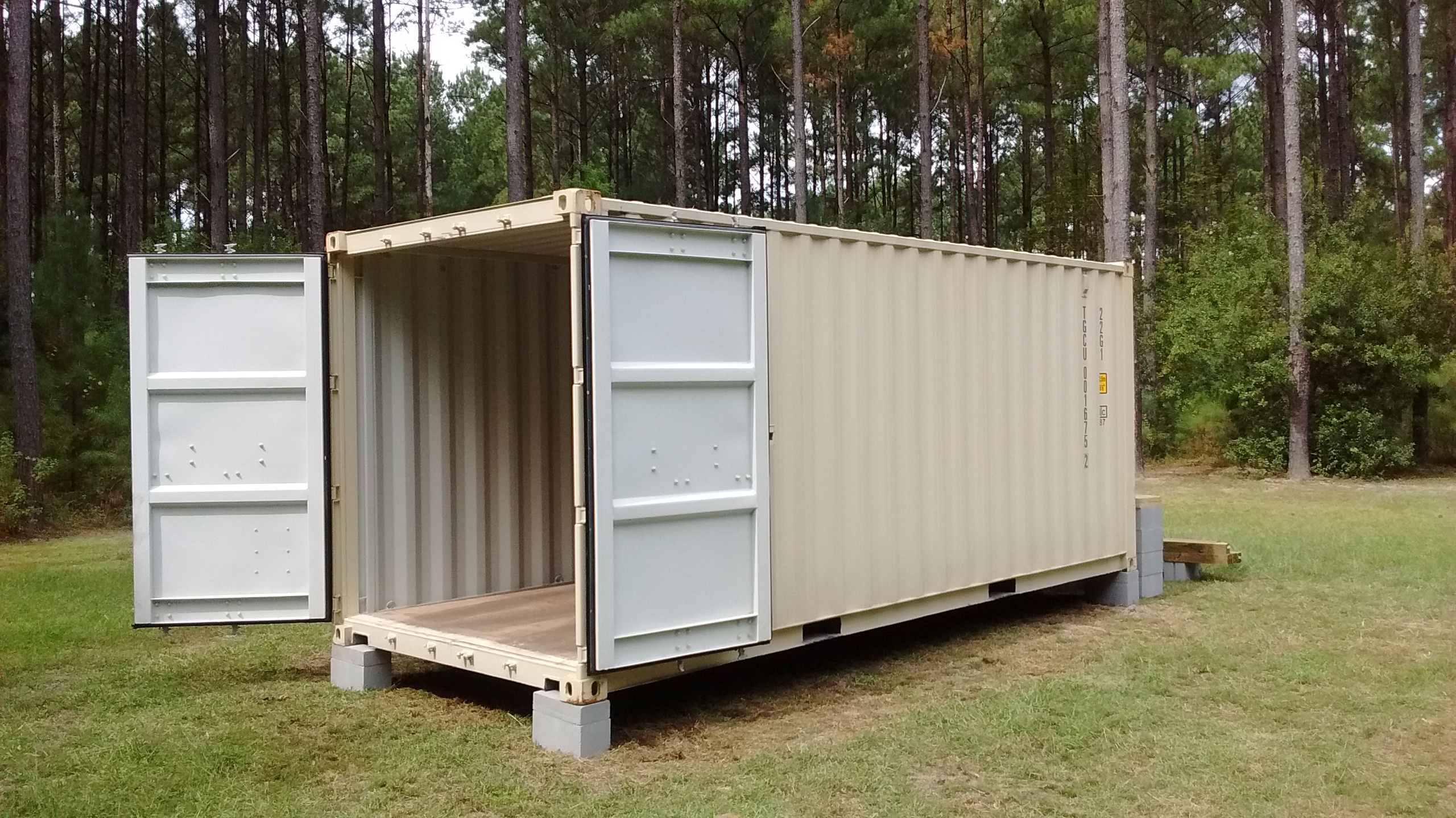 What is the benefit of using a 20ft shipping container as a tiny house?